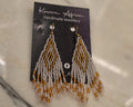 Alfajiri clear and gold earrings with translucent bead fringe, gold-toned accents and gold-toned hooks