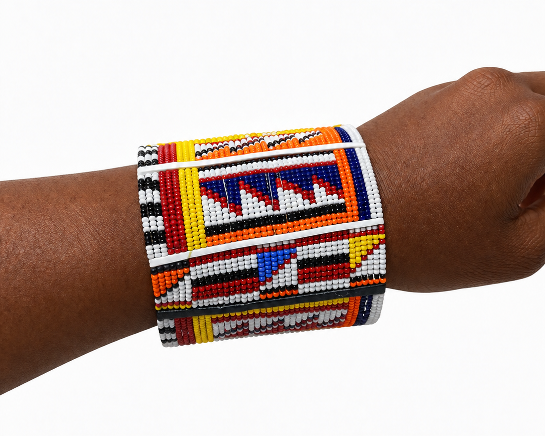 Maasai Cuff Small - wide geometric beaded cuff in white, red, orange and blue, worn on wrist