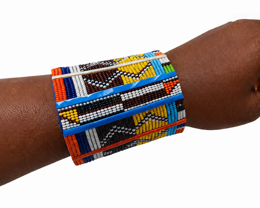 Maasai Cuff Large - wide geometric beaded cuff in earth tones, worn on wrist
