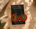Nuru Earrings Red – handmade red beaded brass wire spiral earrings by Kawira Africa