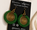 Nuru Earrings Green – handmade green beaded brass wire spiral earrings by Kawira Africa