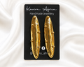Nguzo Drops – handmade elongated hammered gold drop earrings with ball accents by Kawira Africa