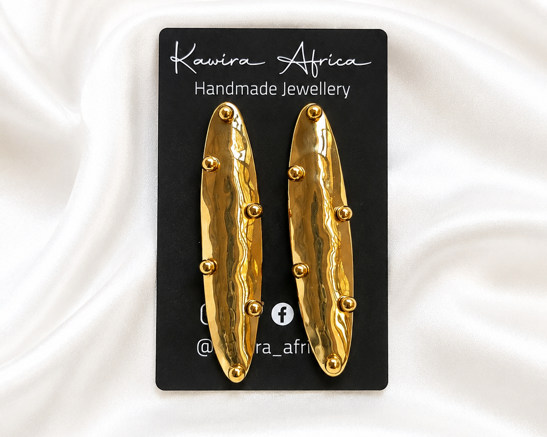 Nguzo Drops – handmade elongated hammered gold drop earrings with ball accents by Kawira Africa