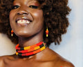 Tausi Necklace - multi-strand seed bead choker in red, orange, yellow and black with matching drop earrings, handmade in Kenya