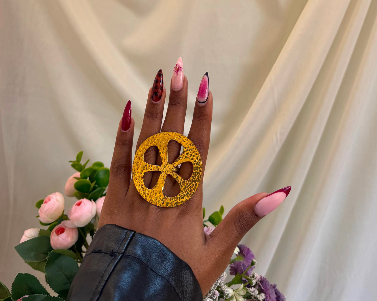Chembe Ring - bold oversized gold disc statement ring worn on hand