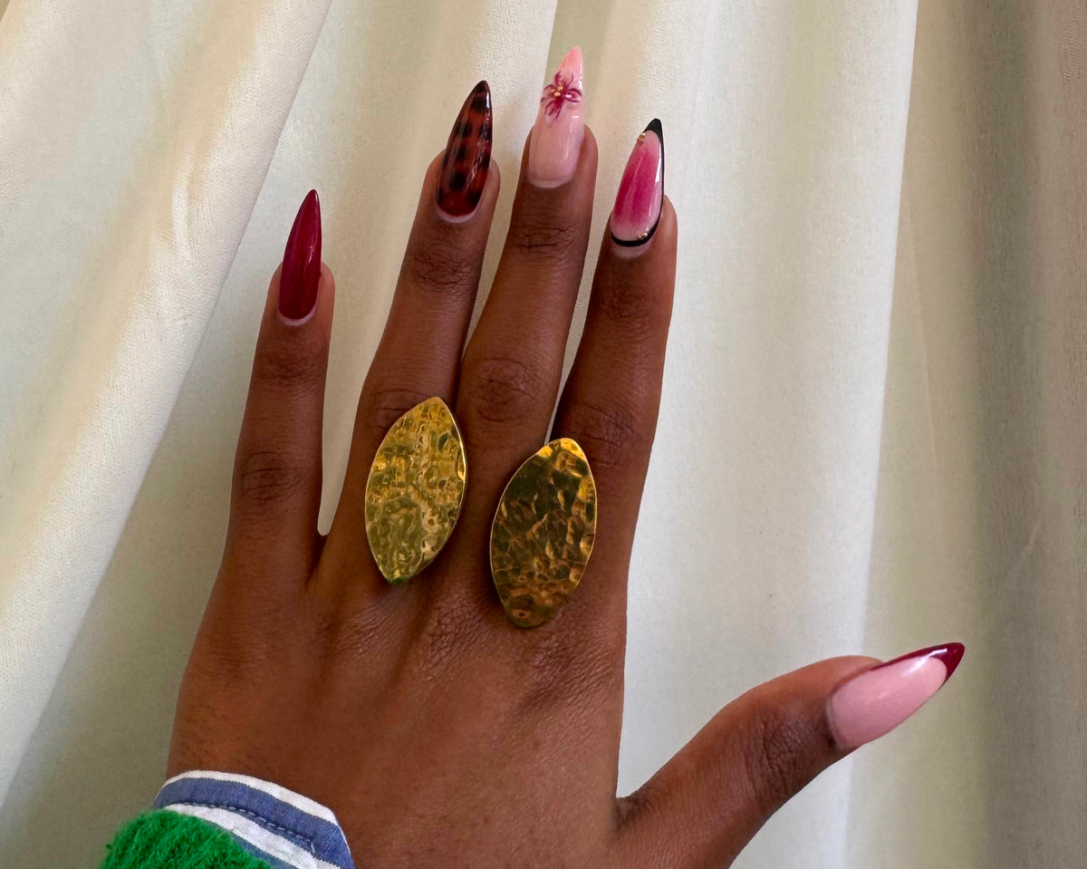 Tembo Textured Ring - two hammered gold oval rings worn together on hand